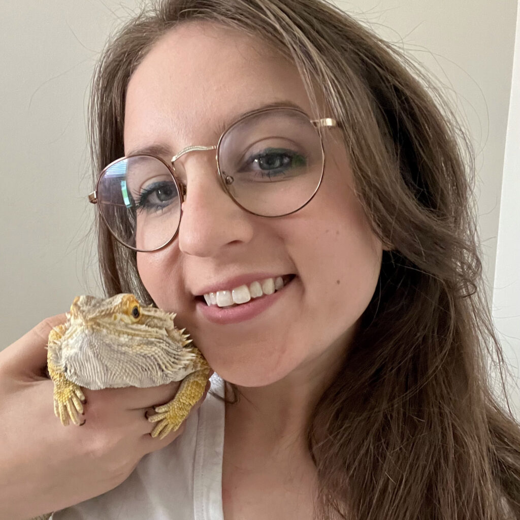 Sarah and her bearded dragon posing for picture